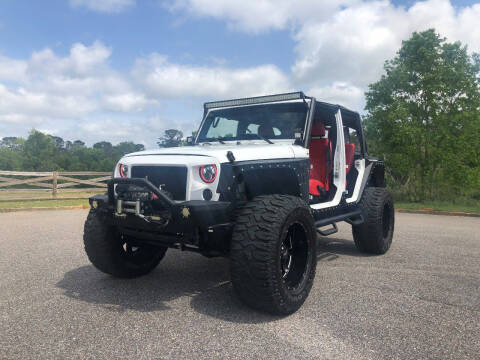 2013 Jeep Wrangler Unlimited for sale at West Mobile Auto Outlet in Mobile AL