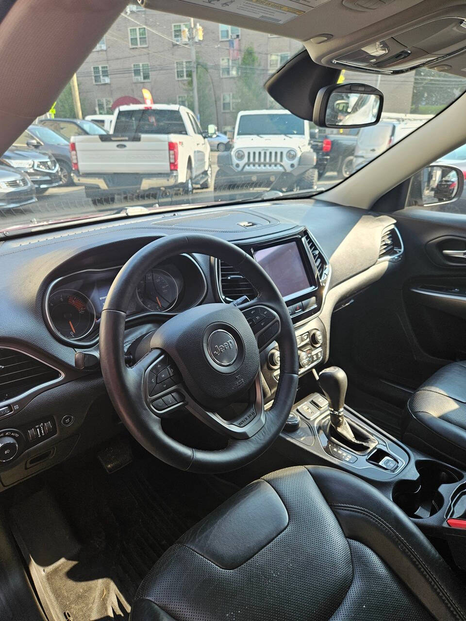 2019 Jeep Cherokee for sale at RENOS AUTO SALES LLC in Waterbury, CT