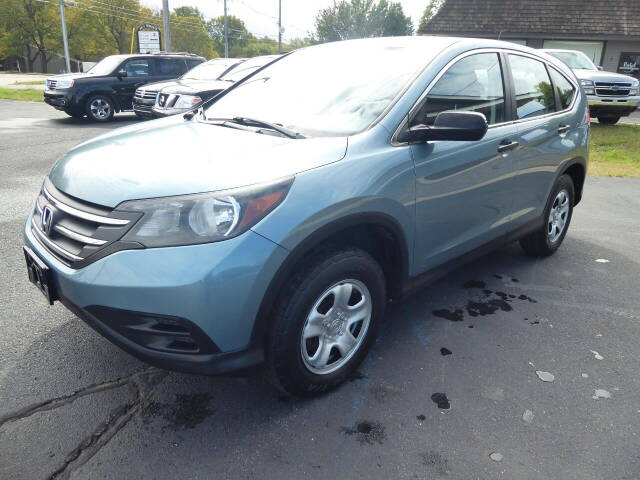 2014 Honda CR-V for sale at Lakeshore Autos in Holland, MI