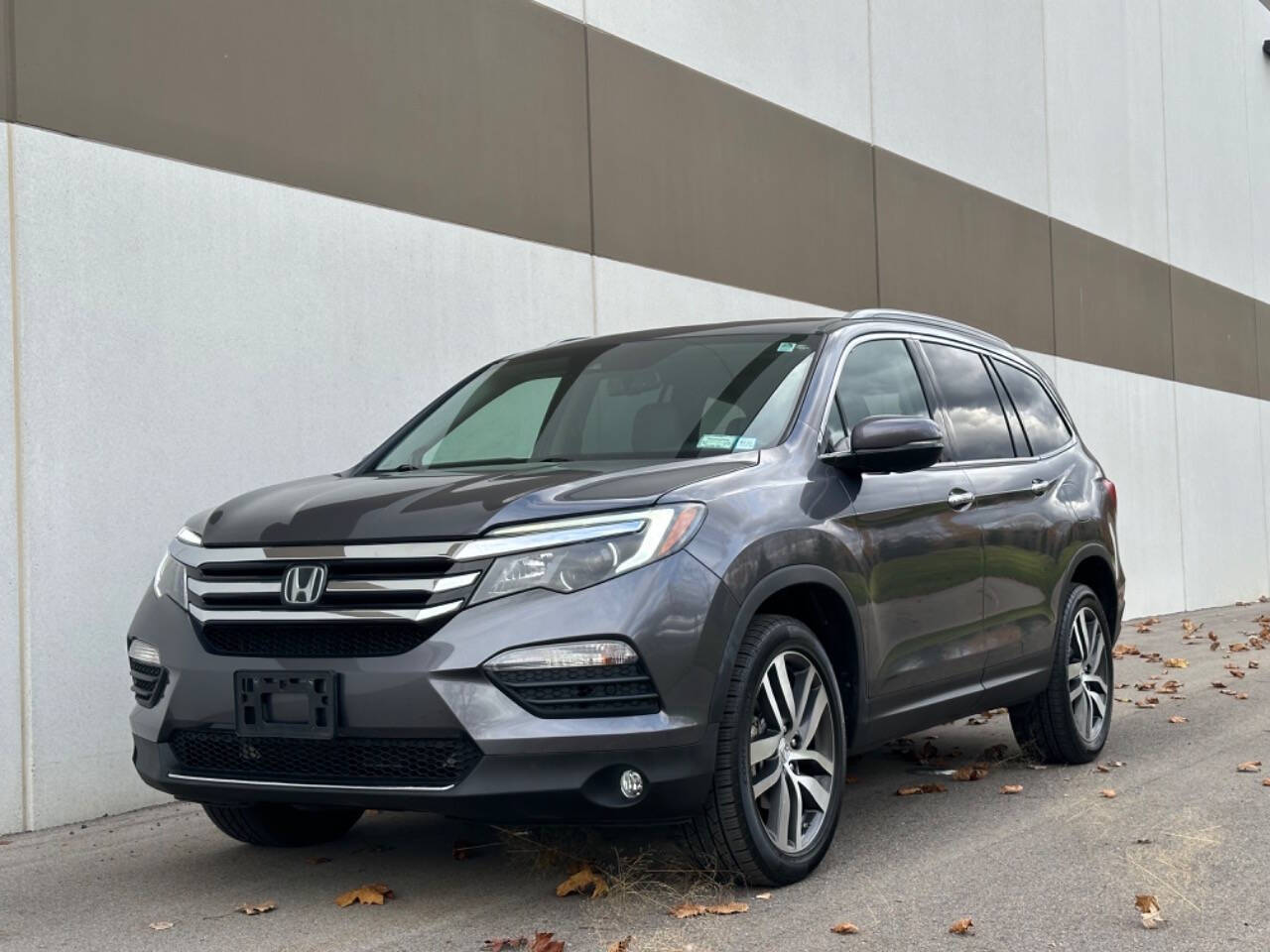 2017 Honda Pilot for sale at Phoenix Motor Co in Romulus, MI