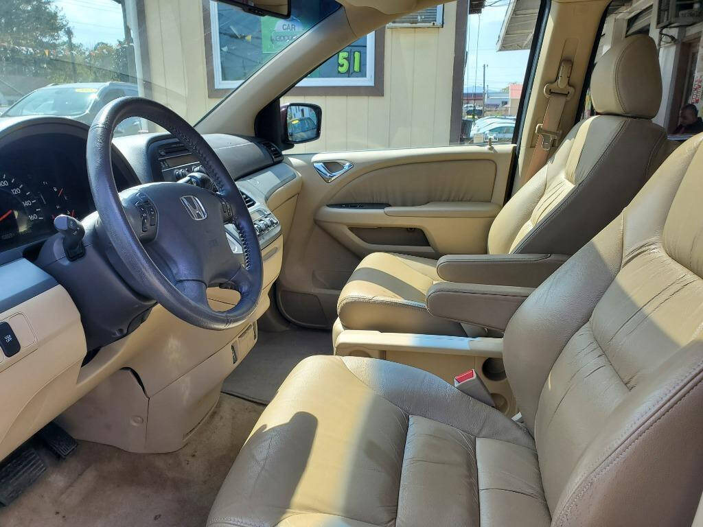 2010 Honda Odyssey for sale at DAGO'S AUTO SALES LLC in Dalton, GA