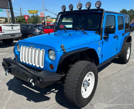 2011 Jeep Wrangler Unlimited for sale at Smith's Cars in Johnson City TN