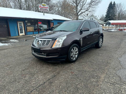 2015 Cadillac SRX for sale at Rombaugh's Auto Sales in Battle Creek MI