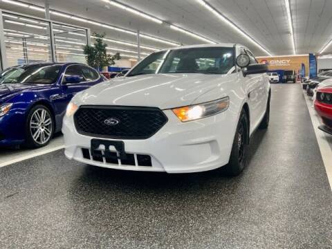 2015 Ford Taurus for sale at Dixie Motors in Fairfield OH