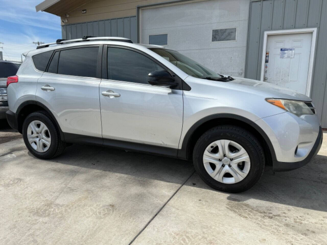 2014 Toyota RAV4 for sale at Carlos Auto Sales LLC in Englewood, CO