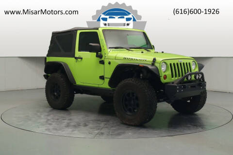 2012 Jeep Wrangler for sale at Misar Motors in Ada MI