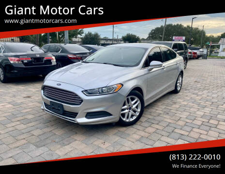 2014 Ford Fusion for sale at Giant Motor Cars in Tampa FL
