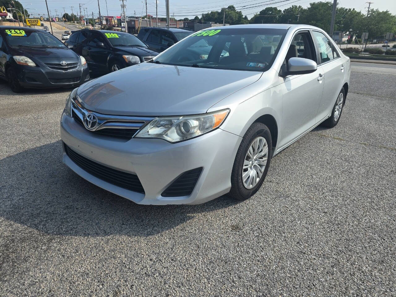 2012 Toyota Camry for sale at QUEENSGATE AUTO SALES in York, PA