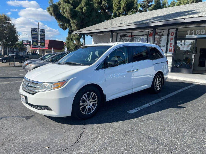 2012 Honda Odyssey for sale at E and M Auto Sales in Bloomington CA
