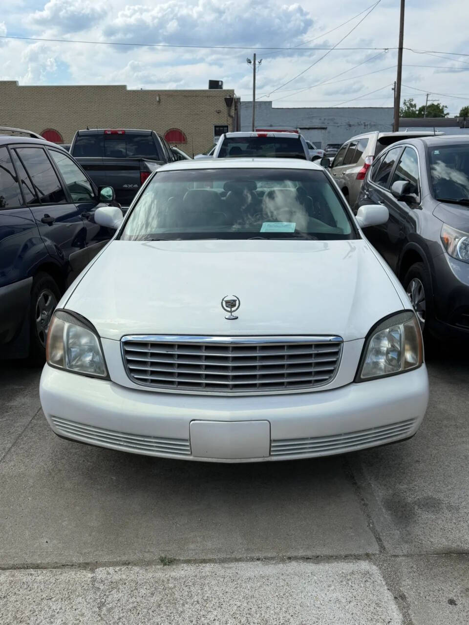 Off white 2004 Cadillac DeVille Base 4dr Sedan 1