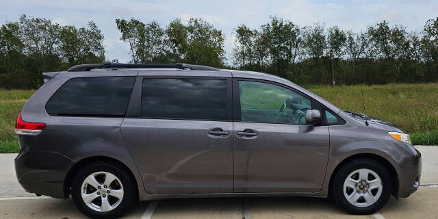 2013 Toyota Sienna for sale at CAR MARKET AUTO GROUP in Sugar Land, TX