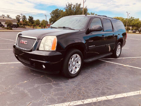 2010 GMC Yukon XL for sale at DUNCAN AUTO SALES, INC in Cartersville GA