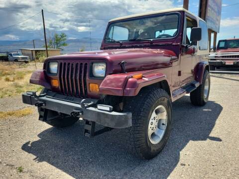 1990 Jeep Wrangler for sale at Bickham Used Cars in Alamogordo NM