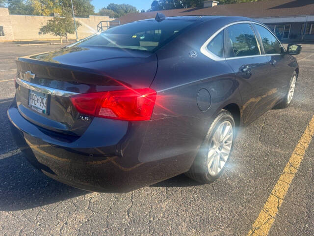 2014 Chevrolet Impala for sale at JUST AUTOS in MINNEAPOLIS, MN