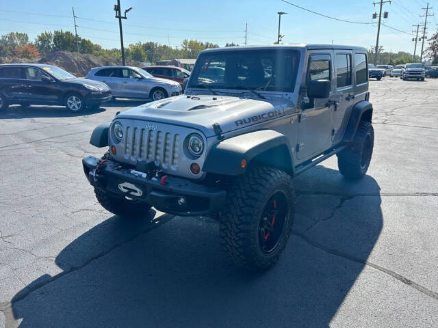 2013 Jeep Wrangler Unlimited for sale at Wyrick Auto Sales & Leasing Inc in Holland, MI