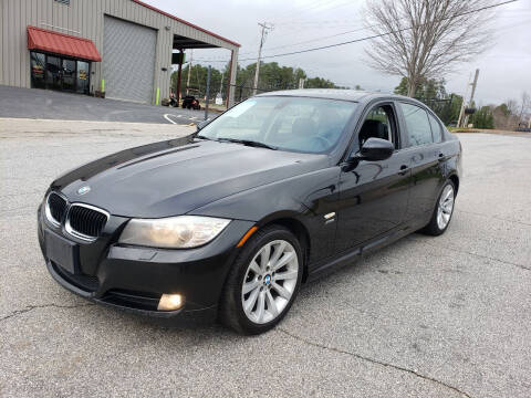 2011 BMW 3 Series for sale at GEORGIA AUTO DEALER LLC in Buford GA