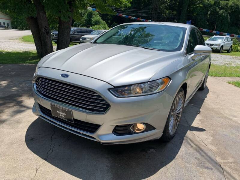 2014 Ford Fusion for sale at Day Family Auto Sales in Wooton KY