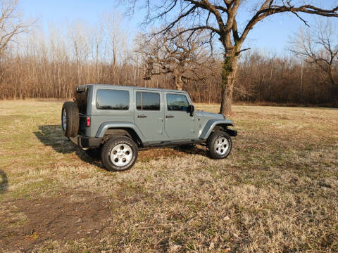 2015 Jeep Wrangler Unlimited for sale at Rustys Auto Sales - Rusty's Auto Sales in Platte City MO