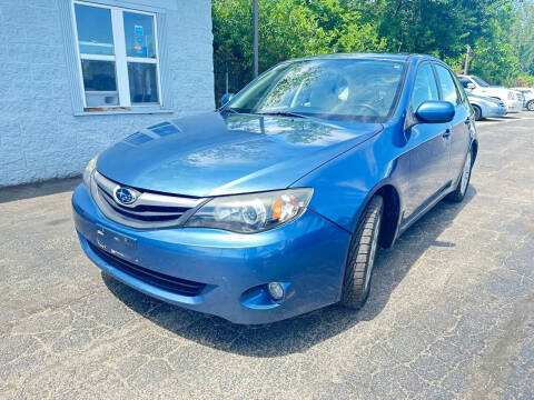 2010 Subaru Impreza for sale at Purcell Auto Sales LLC in Camby IN