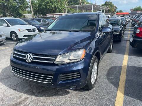 2014 Volkswagen Touareg for sale at America Auto Wholesale Inc in Miami FL
