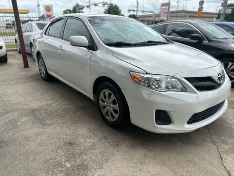 2011 Toyota Corolla for sale at Buy-Fast Autos in Houston TX