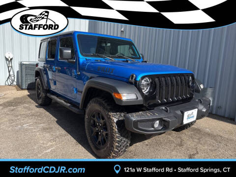 2022 Jeep Wrangler Unlimited for sale at International Motor Group - Stafford CDJR in Stafford Springs, CT