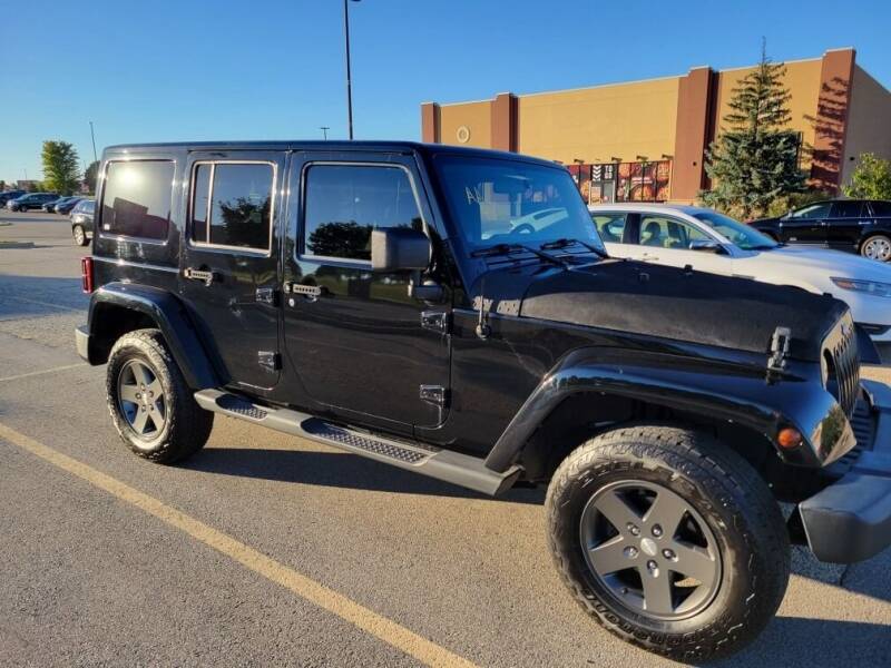 2011 Jeep Wrangler Unlimited for sale at Tumbleson Automotive in Kewanee IL