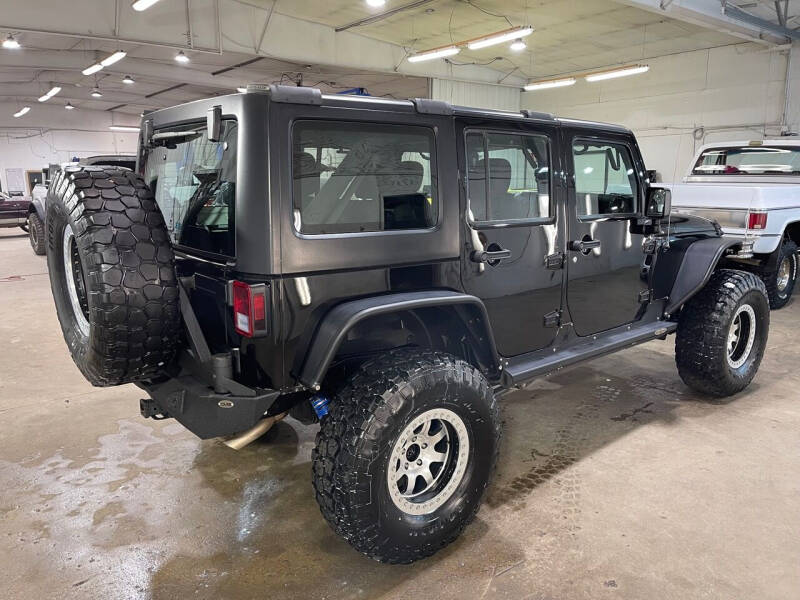 Used 2015 Jeep Wrangler Unlimited Sport with VIN 1C4BJWDG5FL588145 for sale in Sioux Falls, SD