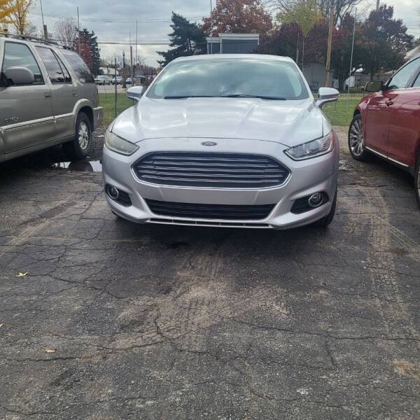 2013 Ford Fusion for sale at Planet Auto Sales in Belleville MI