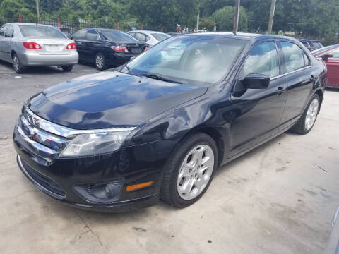 2010 Ford Fusion for sale at Palmer Automobile Sales in Decatur GA