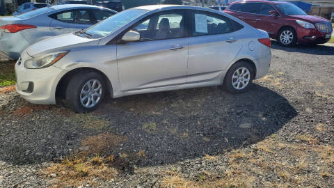 2014 Hyundai Accent for sale at A&R Auto Sales and Services LLC in Connersville IN