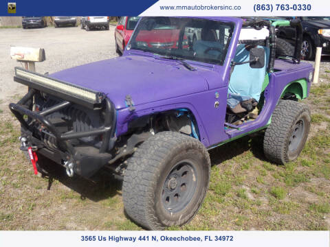 2011 Jeep Wrangler for sale at M & M AUTO BROKERS INC in Okeechobee FL