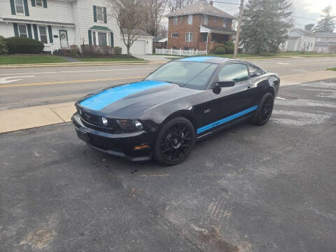 2012 Ford Mustang for sale at Maximum Auto Group II INC in Cortland OH