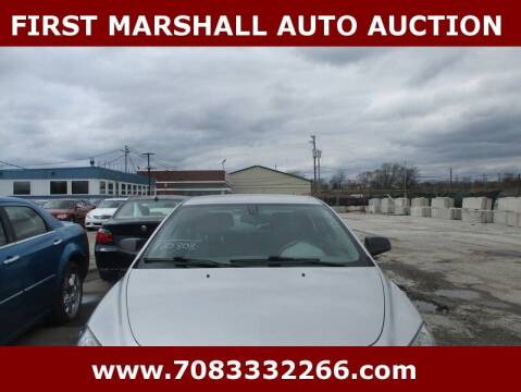 2011 Chevrolet Malibu for sale at First Marshall Auto Auction in Harvey IL