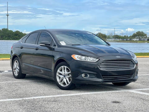 2014 Ford Fusion for sale at EASYCAR GROUP in Orlando FL