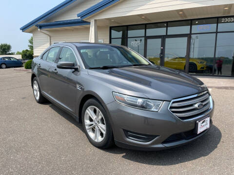 2014 Ford Taurus for sale at The Car Buying Center in Saint Louis Park MN