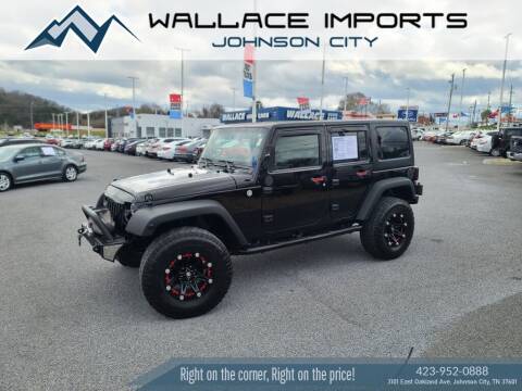 2013 Jeep Wrangler Unlimited for sale at WALLACE IMPORTS OF JOHNSON CITY in Johnson City TN
