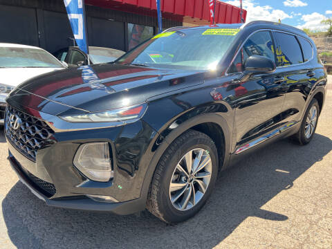 2019 Hyundai Santa Fe for sale at Duke City Auto LLC in Gallup NM