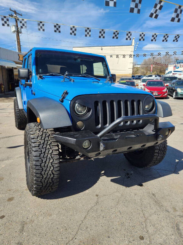 Used 2012 Jeep Wrangler Unlimited Sport with VIN 1C4BJWDG3CL119941 for sale in Provo, UT