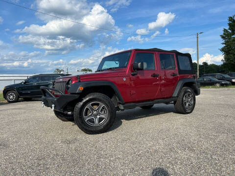 2012 Jeep Wrangler Unlimited for sale at CarWorx LLC in Dunn NC