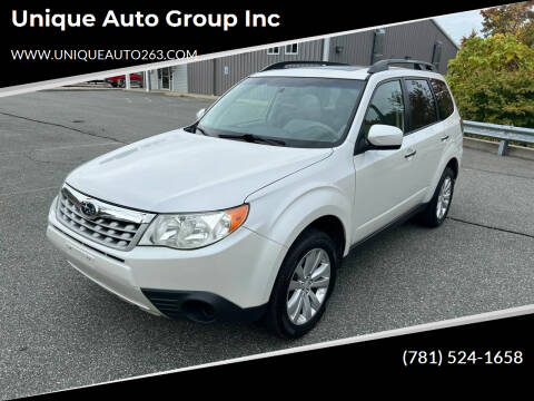 2013 Subaru Forester for sale at Unique Auto Group Inc in Whitman MA