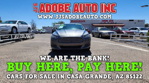 2014 Ford Fusion for sale at JJ's Adobe Auto Inc in Casa Grande AZ