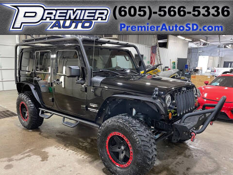 2013 Jeep Wrangler Unlimited for sale at Premier Auto in Sioux Falls SD