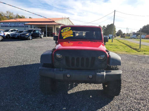 2011 Jeep Wrangler Unlimited for sale at Auto Guarantee, LLC in Eunice LA