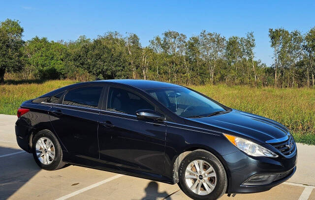 2014 Hyundai SONATA for sale at CAR MARKET AUTO GROUP in Sugar Land, TX