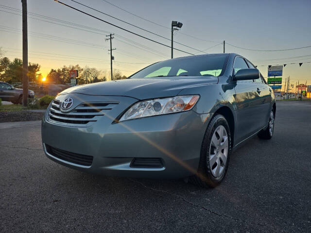 2009 Toyota Camry for sale at GLOBE AUTO SALES in Louisville, KY