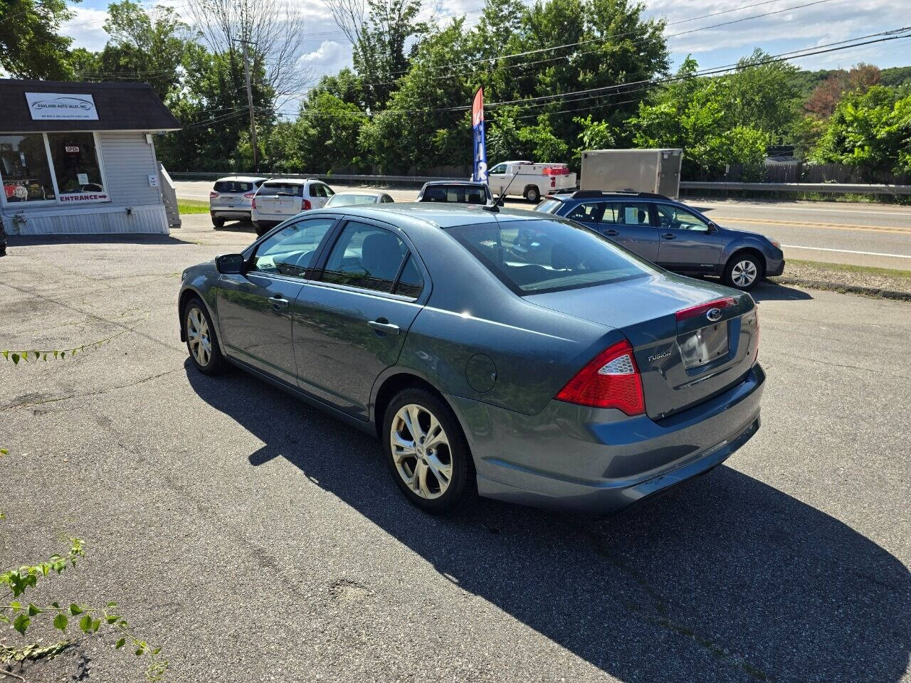 2012 Ford Fusion for sale at PAKLAND AUTO SALES in Auburn, MA