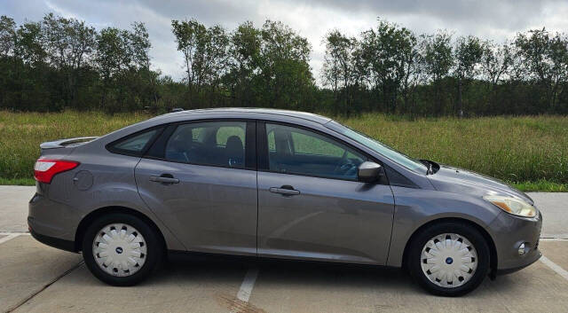 2012 Ford Focus for sale at CAR MARKET AUTO GROUP in Sugar Land, TX