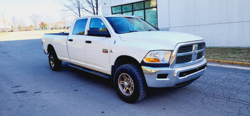 2010 Dodge Ram 2500 for sale at BOOST MOTORS LLC in Sterling VA