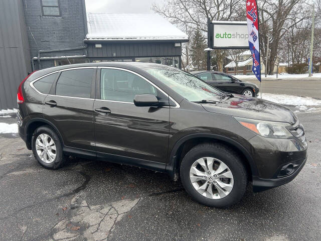 2014 Honda CR-V for sale at Auto Shop in Wyoming, MI